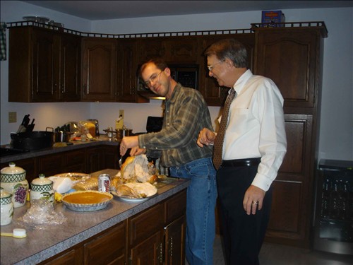 Passing the Turkey Carver Duties. DSC01835-Carving-the-Bird.jpg. Uploaded by Marie Hoffmann on 12/12/2005. 
