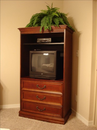 Master bedroom TV, VCR, console, no doors. DSC02771.jpg. Uploaded by Marie Hoffmann on 1/13/2007. 